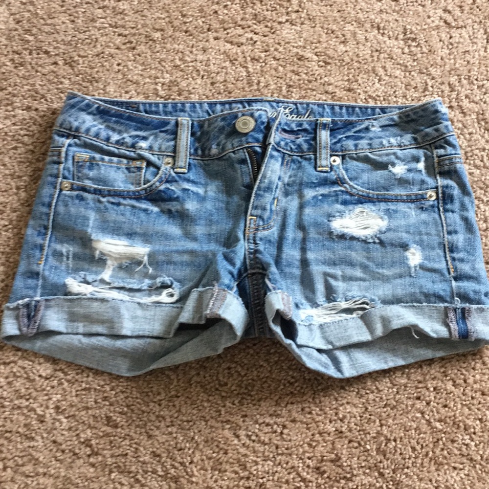 Light wash distressed American Eagle jean shorts